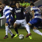 LONDON, ENGLAND - FEBRUARY 15: Jed Wallace of Millwall is challenged by Sam Field and Yoann Barbet of Queens Park Rangers during the Sky Bet Championship match between Millwall and Queens Park Rangers at The Den on February 15, 2022 in London, England. (Photo by Andrew Redington/Getty Images)