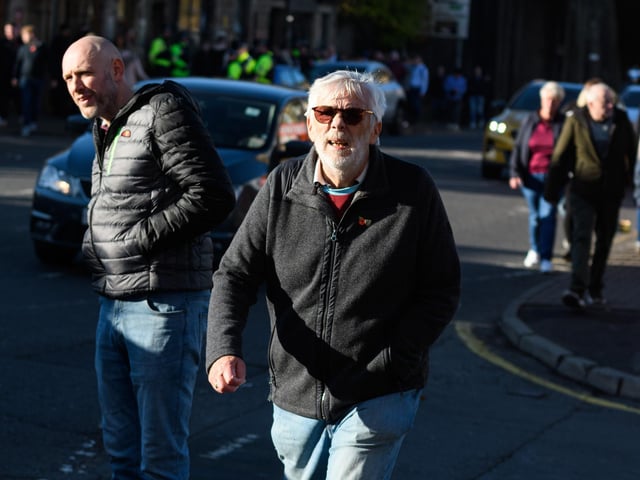 Burnley fans arrive at Turf Moor ahead of the Championship fixture with Blackburn Rovers which ended in a 3-0 victory for the Clarets. Photo: Kelvin Stuttard