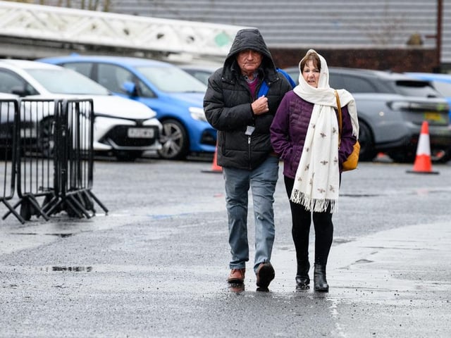 Burnley fans arrive at Turf Moor for the Premier League fixture against West Ham United. Photo: Kelvin Lister-Stuttard