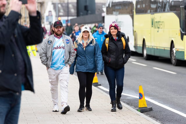 Burnley fans arrive at Turf Moor for the Premier League fixture with Fulham. Photo: Kelvin Lister-Stuttard