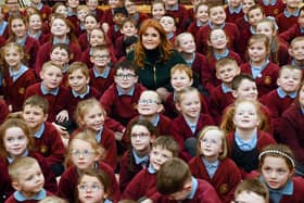 The Duchess of York pictured with pupils at Burnley's Holy Trinity Primary School in Burnley during her visit to the town today