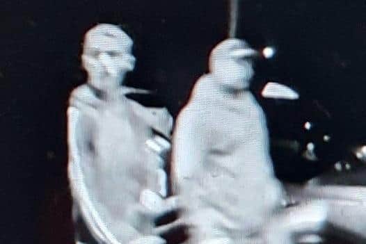 Chorley Police would like to speak to the two people in this CCTV image, who were seen walking away from Bowland Avenue at around 4.13am and may be able to assist with their enquiries.