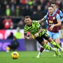 BURNLEY, ENGLAND - FEBRUARY 17: Ben White of Arsenal is fouled by Josh Brownhill of Burnley during the Premier League match between Burnley FC and Arsenal FC at Turf Moor on February 17, 2024 in Burnley, England. (Photo by David Price/Arsenal FC via Getty Images)