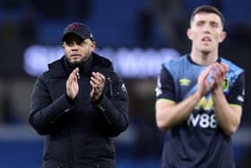 MANCHESTER, ENGLAND - JANUARY 31: Vincent Kompany, Manager of Burnley, applauds the fans after the team's defeat in the Premier League match between Manchester City and Burnley FC at Etihad Stadium on January 31, 2024 in Manchester, England. (Photo by Alex Livesey/Getty Images)