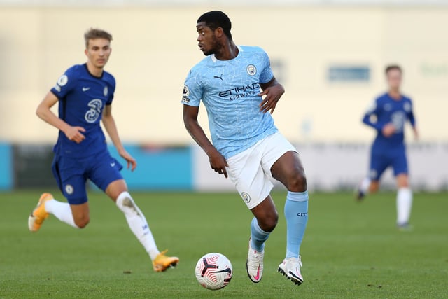 MANCHESTER, ENGLAND - NOVEMBER 22: Luke Mbete of Manchester City is seen on the ball during the Premier League 2 match between Manchester City U23's and Chelsea U23's at The Academy Stadium on November 22, 2020 in Manchester, England. (Photo by Charlotte Tattersall/Getty Images)