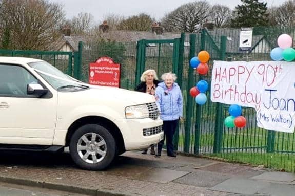 Mrs Joan Draycott (nee Walton) and friend Freda stopped at Christ the King School on a 90th birthday limousine tour in Burnley