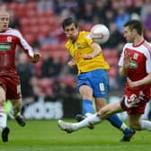 MIDDLESBROUGH, ENGLAND - APRIL 21:  Jack Cork of Southampton shoots past Stephen McManus of Middlesborough during the npower Championship between Middlesbrough and Southampton at Riverside Stadium on April 21, 2012 in Middlesbrough, England.  (Photo by Gareth Copley/Getty Images)