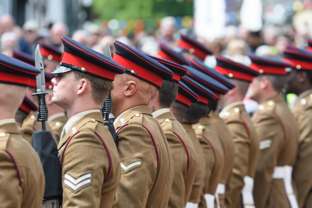 The 1st Battalion of the Duke of Lancaster's Regiment stand to attention during their inspection in Clitheroe.