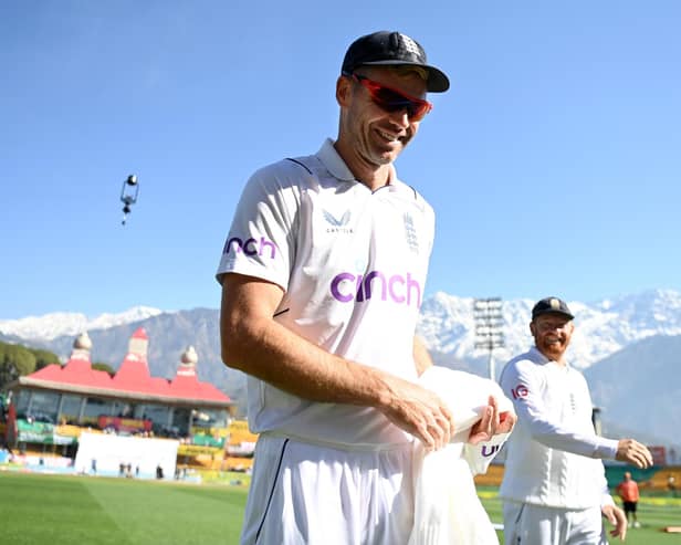 DHARAMSALA, INDIA - MARCH 09: James Anderson of England leaves the field after claiming his 700th test wicket during day three of the 5th Test Match between India and England at Himachal Pradesh Cricket Association Stadium on March 09, 2024 in Dharamsala, India. (Photo by Gareth Copley/Getty Images)