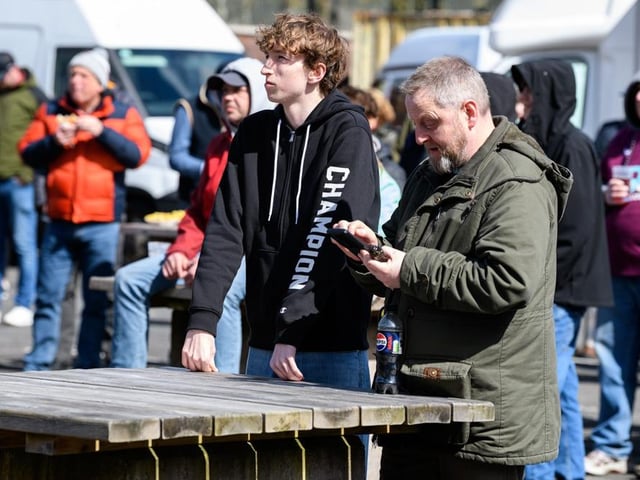 Burnley fans arrive at Turf Moor for the Premier League fixture against Brighton and Hove Albion. Photo: Kelvin Lister-Stuttard