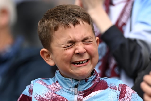 BURNLEY, ENGLAND - MAY 22: A Burnley fan reacts following defeat and relegation to the Sky Bet Championship following the Premier League match between Burnley and Newcastle United at Turf Moor on May 22, 2022 in Burnley, England. (Photo by Gareth Copley/Getty Images)