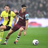LONDON, ENGLAND - MARCH 10: Nayef Aguerd of West Ham United holds off Sander Berge of Burnley  during the Premier League match between West Ham United and Burnley FC at London Stadium on March 10, 2024 in London, England. (Photo by Justin Setterfield/Getty Images)