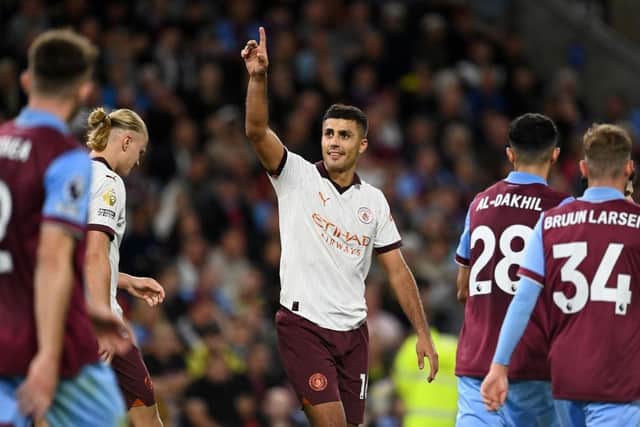 BURNLEY, ENGLAND - AUGUST 11: Rodri of Manchester City celebrates after scoring the team's third goal  during the Premier League match between Burnley FC and Manchester City at Turf Moor on August 11, 2023 in Burnley, England. (Photo by Michael Regan/Getty Images)