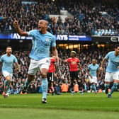 MANCHESTER, ENGLAND - APRIL 07:  Vincent Kompany of Manchester City celebrates scoring his side's first goal during the Premier League match between Manchester City and Manchester United at Etihad Stadium on April 7, 2018 in Manchester, England.  (Photo by Michael Regan/Getty Images)