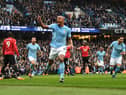 MANCHESTER, ENGLAND - APRIL 07:  Vincent Kompany of Manchester City celebrates scoring his side's first goal during the Premier League match between Manchester City and Manchester United at Etihad Stadium on April 7, 2018 in Manchester, England.  (Photo by Michael Regan/Getty Images)