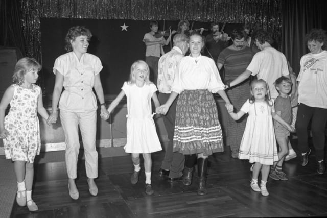 This group of people look like they are having fun during a Folk fiesta workshop at Morecambe Superdome