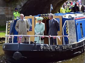 Queen Elizabeth II, The Duke of Edinburgh and The Prince of Wales  make their way along the Leeds and Liverpool canal on the barge 'Pride Of Sefton', during a trip to Burnley, Lancashire. PRESS ASSOCIATION Photo. Picture date: Wednesday May 16, 2012. The Queen and Duke are taking part in a two day tour of the North West as part of this years Jubilee celebrations. Photo credit should read: Christopher Furlong/PA Wire