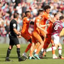 Burnley's Ian Maatsen gets involved in an altercation following an incident with Blackpool's Sonny Carey (not pictured). Both were subsequently shown a red card by referee Keith Stroud

The EFL Sky Bet Championship - Burnley v Blackpool - Saturday 20th August 2022 - Turf Moor - Burnley