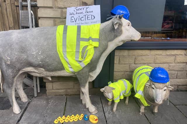 Stephen Hallworth fun pranks on the roadworks outside S R Hallworth butchers in Whalley.