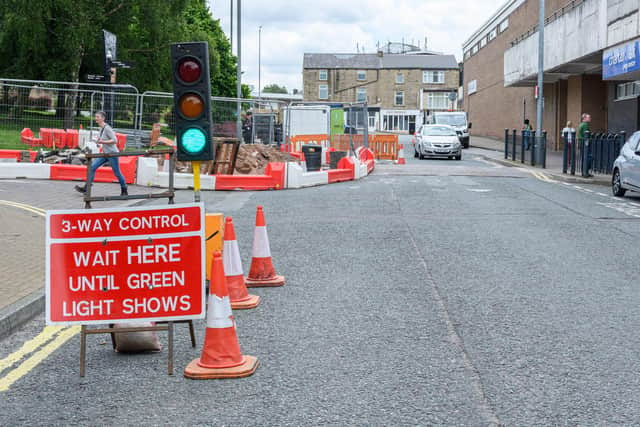 The roadworks on Standish Street which are causing parking problems and leaving traders worried about their businesses. Photo: Kelvin Stuttard
