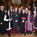 Members of Building Bridges in Burnley with the Archbishop of York at St Peter's Church. PICTURE: Clive Lawrence