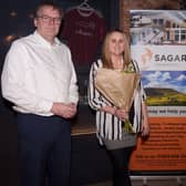 Sagar Insurances managing director Neil Baxter and colleagues Clarissa Taylor and Emily Haire who helped organise the event