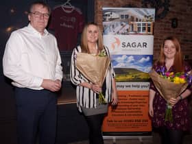 Sagar Insurances managing director Neil Baxter and colleagues Clarissa Taylor and Emily Haire who helped organise the event