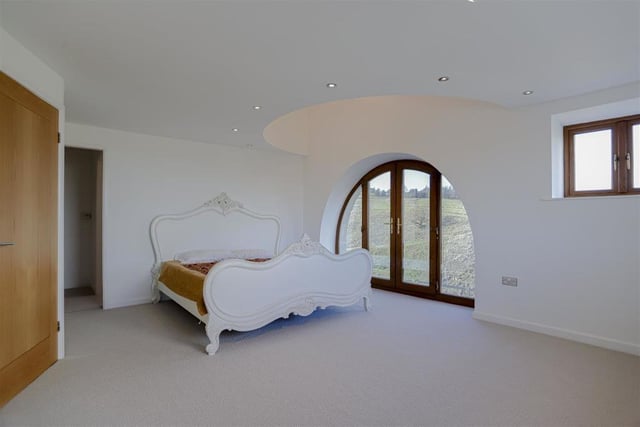 Bedroom with lovely arched window