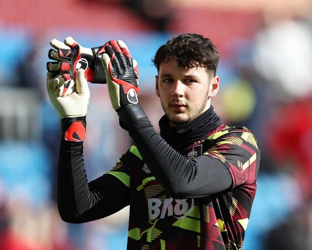 BURNLEY, ENGLAND - MARCH 03: James Trafford of Burnley acknowledges fans during the Premier League match between Burnley FC and AFC Bournemouth at Turf Moor on March 03, 2024 in Burnley, England. (Photo by Matt McNulty/Getty Images)