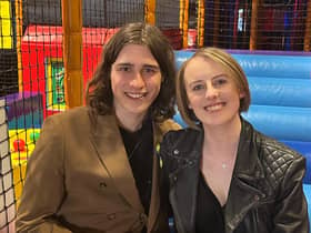 Singer Patrick Ralphson with his 'oldest friend' Laura Nuttall in the ball pool at the charity ball held in her honour