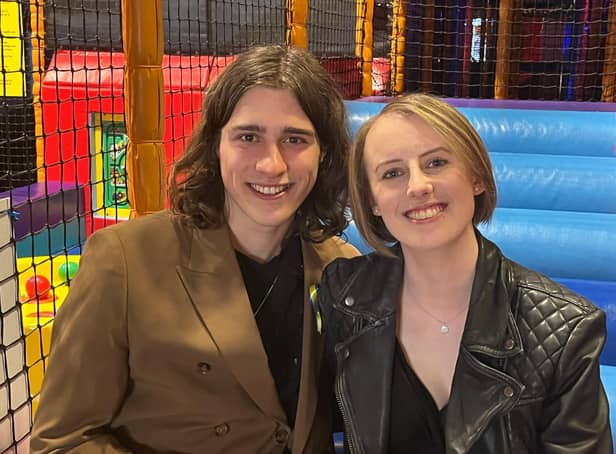Singer Patrick Ralphson with his 'oldest friend' Laura Nuttall in the ball pool at the charity ball held in her honour