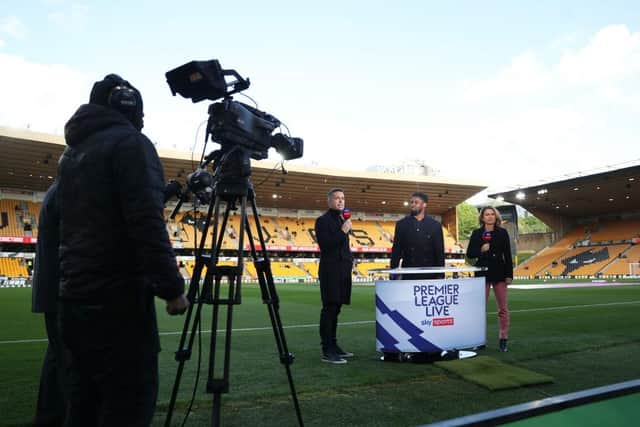 WOLVERHAMPTON, ENGLAND - MAY 11: A general view inside the stadium as Sky Sports TV Presenters Dave Jones, Micah Richards and Karen Carney look on prior to the Premier League match between Wolverhampton Wanderers and Manchester City at Molineux on May 11, 2022 in Wolverhampton, England. (Photo by Catherine Ivill/Getty Images)