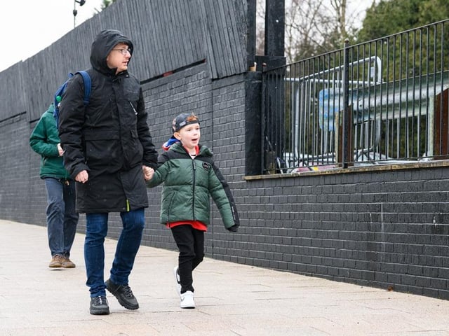Burnley fans arrive at Turf Moor for the Premier League fixture against West Ham United. Photo: Kelvin Lister-Stuttard