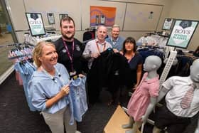 Volunteers (left to right) Cathryn Swift, Nathan Norris, Mark Hull, Dominic Cooper and Maria Bolton inside the free school uniform shop in Burnley on its opening day. The shop kitted out 710 children