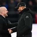 BURNLEY, ENGLAND - DECEMBER 16: Sean Dyche, Manager of Everton, (L) and Vincent Kompany, Manager of Burnley, shake hands prior to the Premier League match between Burnley FC and Everton FC at Turf Moor on December 16, 2023 in Burnley, England. (Photo by Gareth Copley/Getty Images)