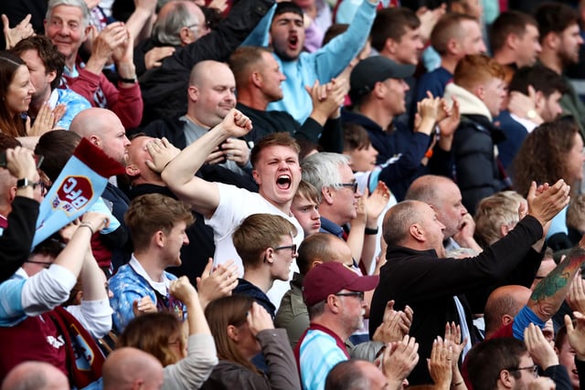 BURNLEY, ENGLAND - MAY 22: Burnley fans celebrate their side's first goal during the Premier League match between Burnley and Newcastle United at Turf Moor on May 22, 2022 in Burnley, England. (Photo by Jan Kruger/Getty Images)