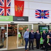 Mr Donaldson, Mrs Springthorpe and AFSG members at the flag event at Colne Asda