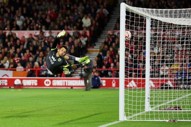 NOTTINGHAM, ENGLAND - SEPTEMBER 18: James Trafford of Burnley fails to save a shot from Callum Hudson-Odoi of Nottingham Forest (not pictured) as he scores his side's first goal during the Premier League match between Nottingham Forest and Burnley FC at City Ground on September 18, 2023 in Nottingham, England. (Photo by Marc Atkins/Getty Images)