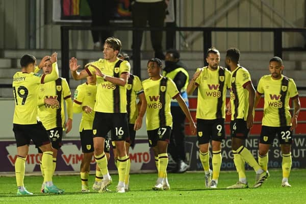 SALFORD, ENGLAND - SEPTEMBER 26: Sander Berge of Burnley celebrates with teammates after scoring the team's first goal during the Carabao Cup Third Round match between Salford City and Burnley at Peninsula Stadium on September 26, 2023 in Salford, England. (Photo by Michael Regan/Getty Images)