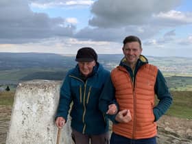 David Herbert celebrating his 83rd birthday with eldest son, Neil, at the top of Pendle Hill