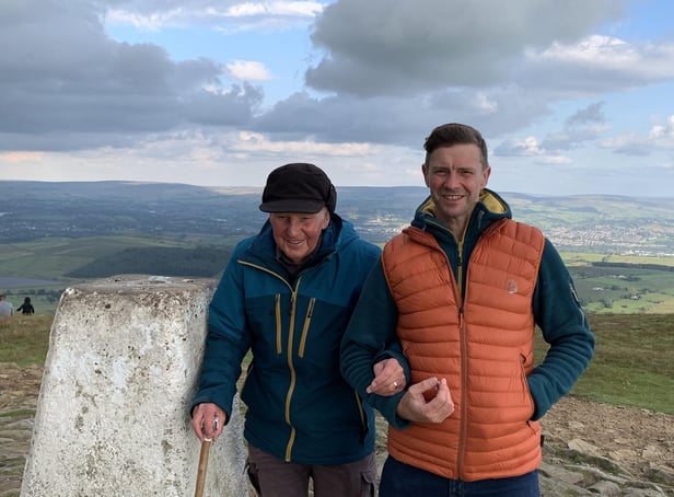 David Herbert celebrating his 83rd birthday with eldest son, Neil, at the top of Pendle Hill