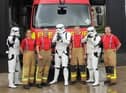 Burnley firefighters with Star Wars stormtroopers at a charity car wash they organised last year
