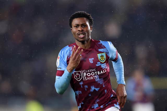 HULL, ENGLAND - MARCH 15: Nathan Tella of Burnley celebrates after scoring the team's third and his hattrick goal during the Sky Bet Championship between Hull City and Burnley at MKM Stadium on March 15, 2023 in Hull, England. (Photo by George Wood/Getty Images)
