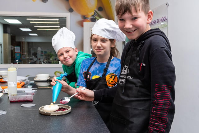 Youngsters on a cookery course at the Down Town Kitchen & Cafe in Burnley Town Centre. Photo: Kelvin Lister-Stuttard