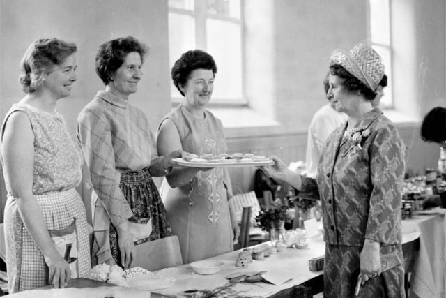 So successful was the first-ever fete to raise funds for St Peter's Church, Burnley, that it may become an annual event. The fete held at the school on Saturday, 19th June 1971, attracted large crowds. The refreshment stall, perhaps with Mrs McCaul, former deputy headmistress, on the right.