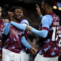 Burnley's Nathan Tella (centre) celebrates scoring the opening goal with teammates 

The Emirates FA Cup Fourth Round Replay - Burnley v Ipswich Town - Tuesday 7th February 2023 - Turf Moor - Burnley