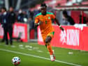 UTRECHT, NETHERLANDS - OCTOBER 13: Maxwel Cornet of Ivory Coast in action during the international friendly match between Japan and Ivory Coast at Stadion Galgenwaard on October 13, 2020 in Utrecht, Netherlands. (Photo by Dean Mouhtaropoulos/Getty Images)