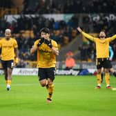 WOLVERHAMPTON, ENGLAND - DECEMBER 05: Hwang Hee-Chan of Wolverhampton Wanderers celebrates after scoring the team's first goal during the Premier League match between Wolverhampton Wanderers and Burnley FC at Molineux on December 05, 2023 in Wolverhampton, England. (Photo by Michael Regan/Getty Images)