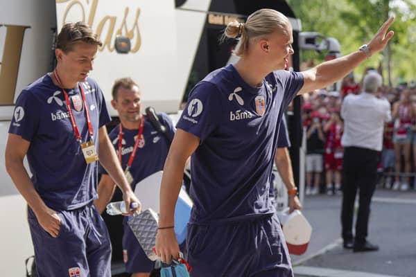 Norway's players Sander Berge (L) and Erling Braut Haaland arrive prior to the UEFA Euro 2024 group A qualification football match between Norway and Scotland in Oslo on June 17, 2023. (Photo by Heiko Junge / NTB / AFP) / Norway OUT (Photo by HEIKO JUNGE/NTB/AFP via Getty Images)