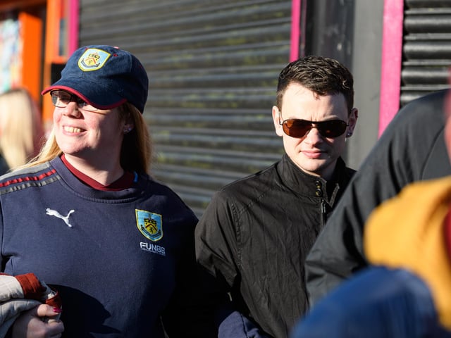 Burnley fans arrive at Turf Moor ahead of the Championship fixture with Blackburn Rovers which ended in a 3-0 victory for the Clarets. Photo: Kelvin Stuttard